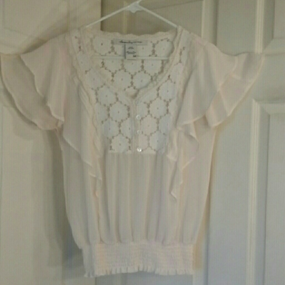 American Rag sheer cream blouse.
